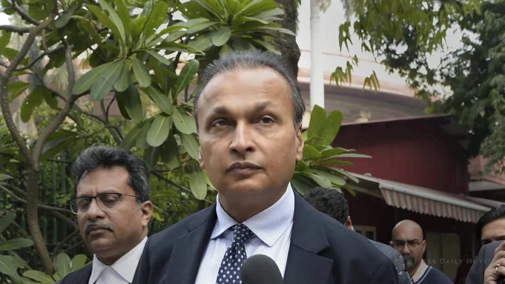 Exterior of a corporate building with official vehicles, representing the ED raid on Anil Ambani's premises in a money laundering case.
